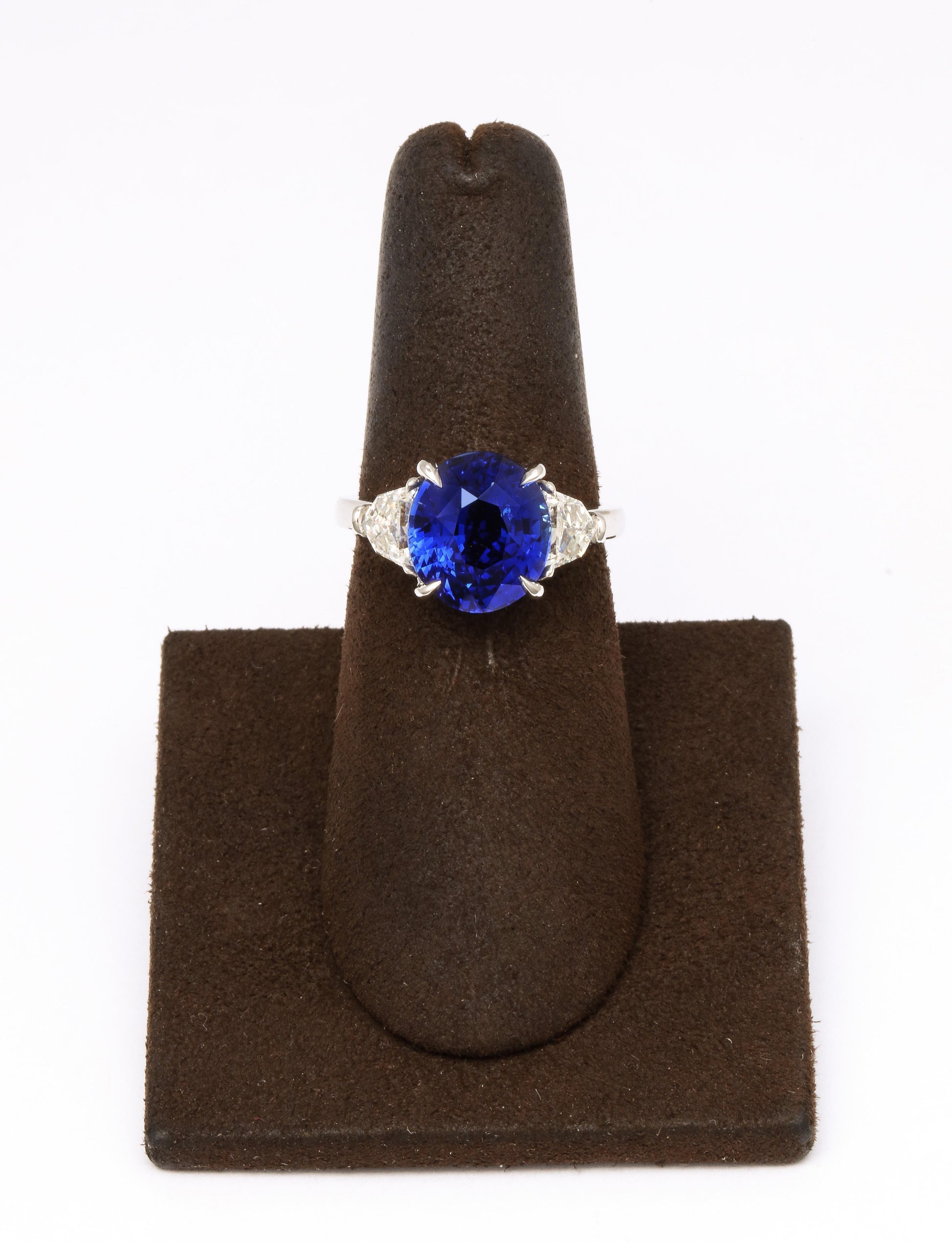 https://a.1stdibscdn.com/6-carat-oval-blue-sapphire-and-diamond-ring-for-sale-picture-5/j_415/j_144397421641927203833/6R1A8328_master.jpg