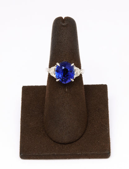 https://a.1stdibscdn.com/6-carat-oval-blue-sapphire-and-diamond-ring-for-sale-picture-5/j_415/j_144397421641927203833/6R1A8328_master.jpg