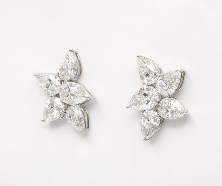 https://a.1stdibscdn.com/diamond-cluster-earrings-for-sale-picture-9/j_415/j_145871221643387926826/6R1A8369_master.jpg?width=768