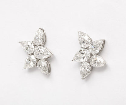 https://a.1stdibscdn.com/diamond-cluster-earrings-for-sale-picture-9/j_415/j_145871221643387926826/6R1A8369_master.jpg?width=768