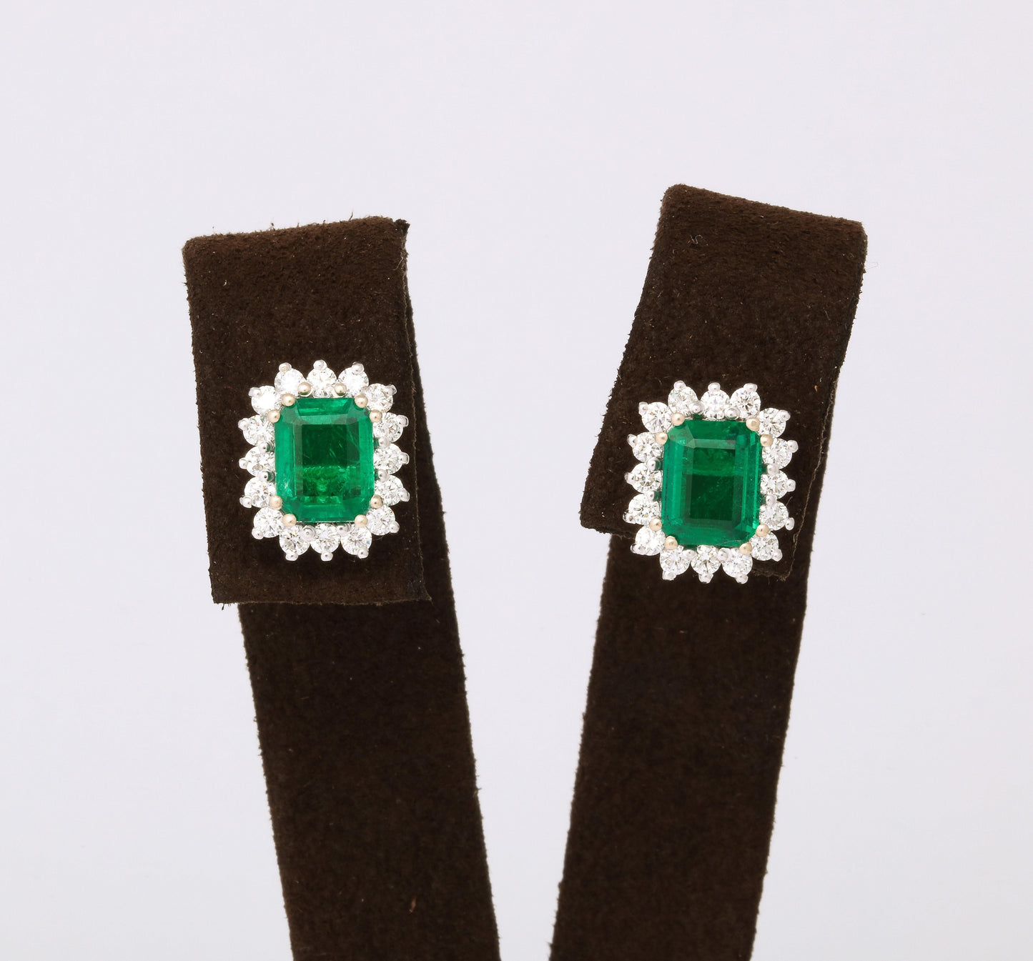Exquisite 7.62 Carat Intense Green Emerald Diamond Platinum Stud Earrings