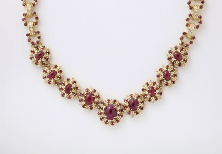 https://a.1stdibscdn.com/ruby-and-diamond-necklace-and-earring-set-for-sale-picture-5/j_415/j_229927221717077968591/6R1A8602_master.jpg?width=768