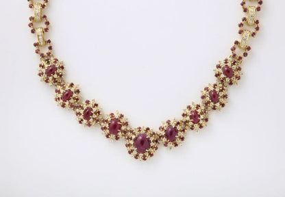 https://a.1stdibscdn.com/ruby-and-diamond-necklace-and-earring-set-for-sale-picture-5/j_415/j_229927221717077968591/6R1A8602_master.jpg?width=768