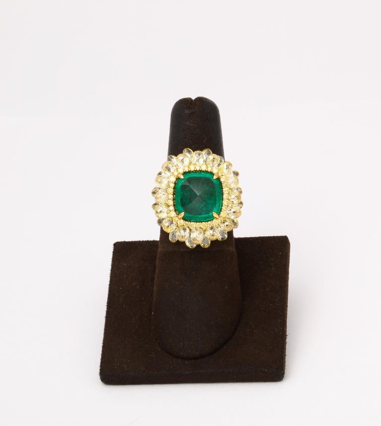 https://a.1stdibscdn.com/5-carat-sugarloaf-cabochon-emerald-and-yellow-diamond-ring-for-sale-picture-5/j_415/j_202926121694024693866/6R1A8713_master.jpg?width=768