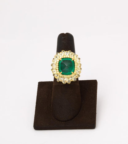 https://a.1stdibscdn.com/5-carat-sugarloaf-cabochon-emerald-and-yellow-diamond-ring-for-sale-picture-5/j_415/j_202926121694024693866/6R1A8713_master.jpg?width=768