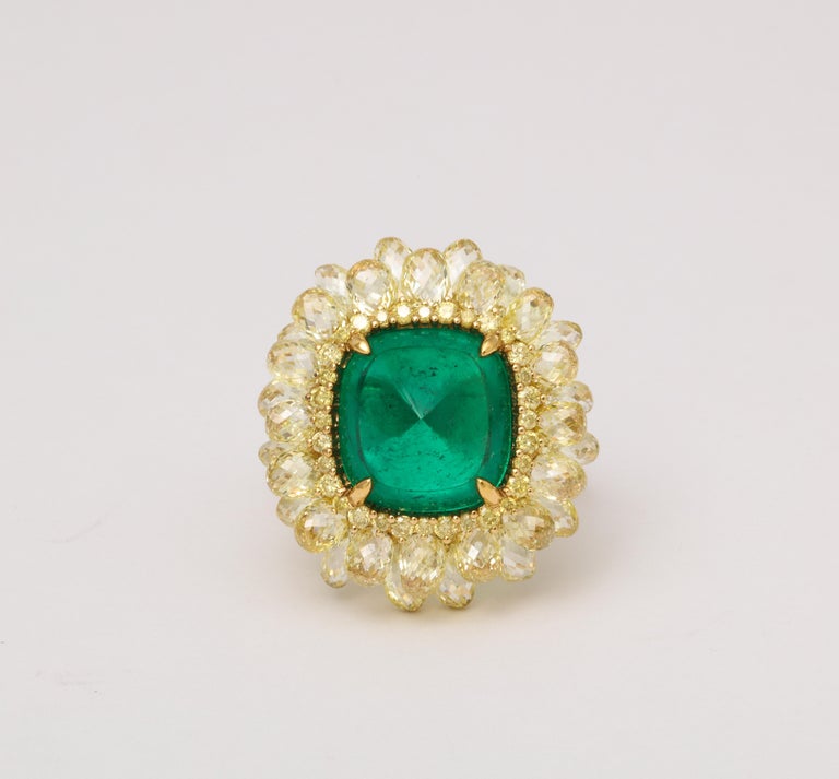 https://a.1stdibscdn.com/5-carat-sugarloaf-cabochon-emerald-and-yellow-diamond-ring-for-sale-picture-9/j_415/j_202926121694024696306/6R1A8717_master.jpg?width=768