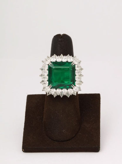 https://a.1stdibscdn.com/13-carat-emerald-and-diamond-ring-for-sale-picture-6/j_415/j_203160921694195656738/6R1A8733_master.jpg?width=768