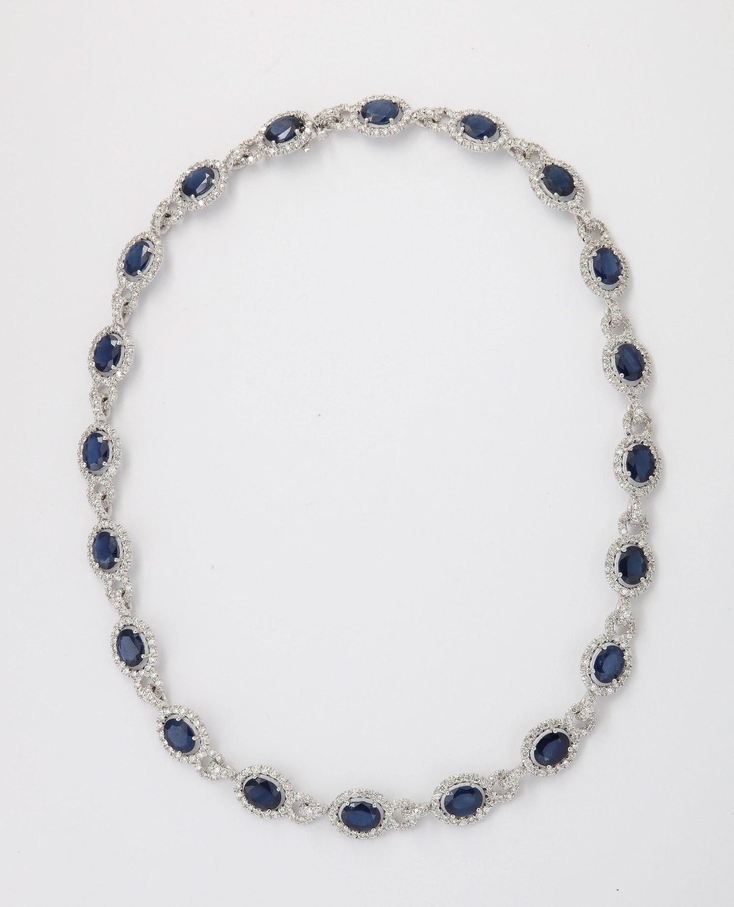 https://a.1stdibscdn.com/sapphire-and-diamond-necklace-for-sale-picture-8/j_415/j_203672721694713994308/6R1A8760_master.jpg