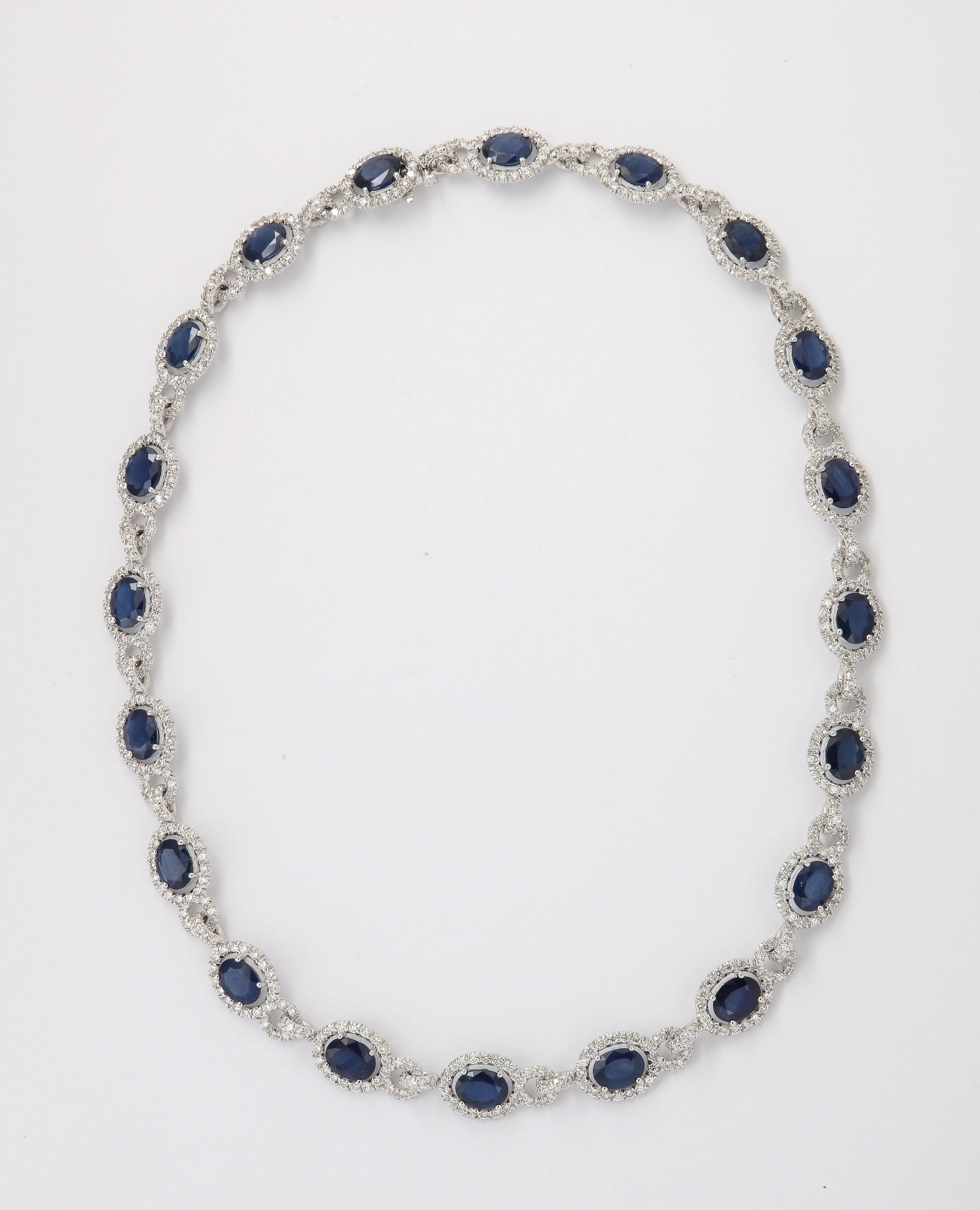 https://a.1stdibscdn.com/sapphire-and-diamond-necklace-for-sale-picture-8/j_415/j_203672721694713994308/6R1A8760_master.jpg