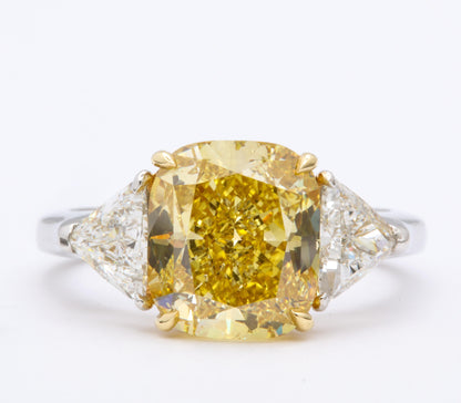https://a.1stdibscdn.com/gia-certified-4-carat-fancy-intense-yellow-diamond-ring-for-sale-picture-5/j_415/1598973568687/6R1A9303_master.jpg