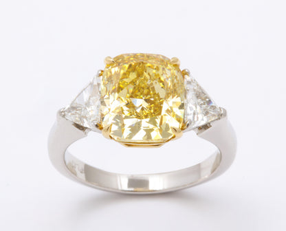 GIA Certified 4 Carat Fancy Intense Yellow Diamond Platinum Ring