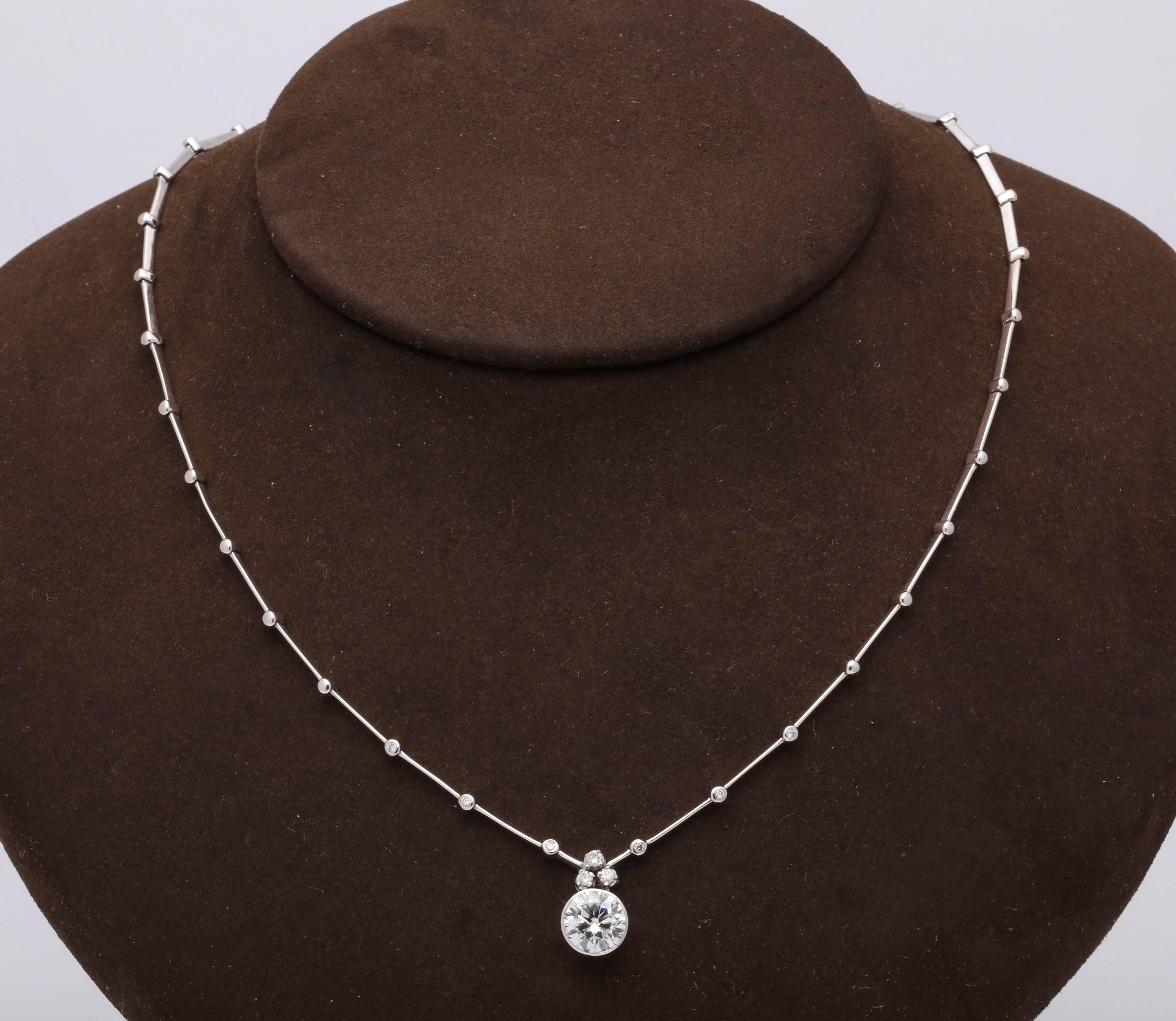 https://a.1stdibscdn.com/round-diamond-solitaire-necklace-gia-certified-for-sale-picture-9/0/j_42665831525894134700/6R1A9458_master.jpg