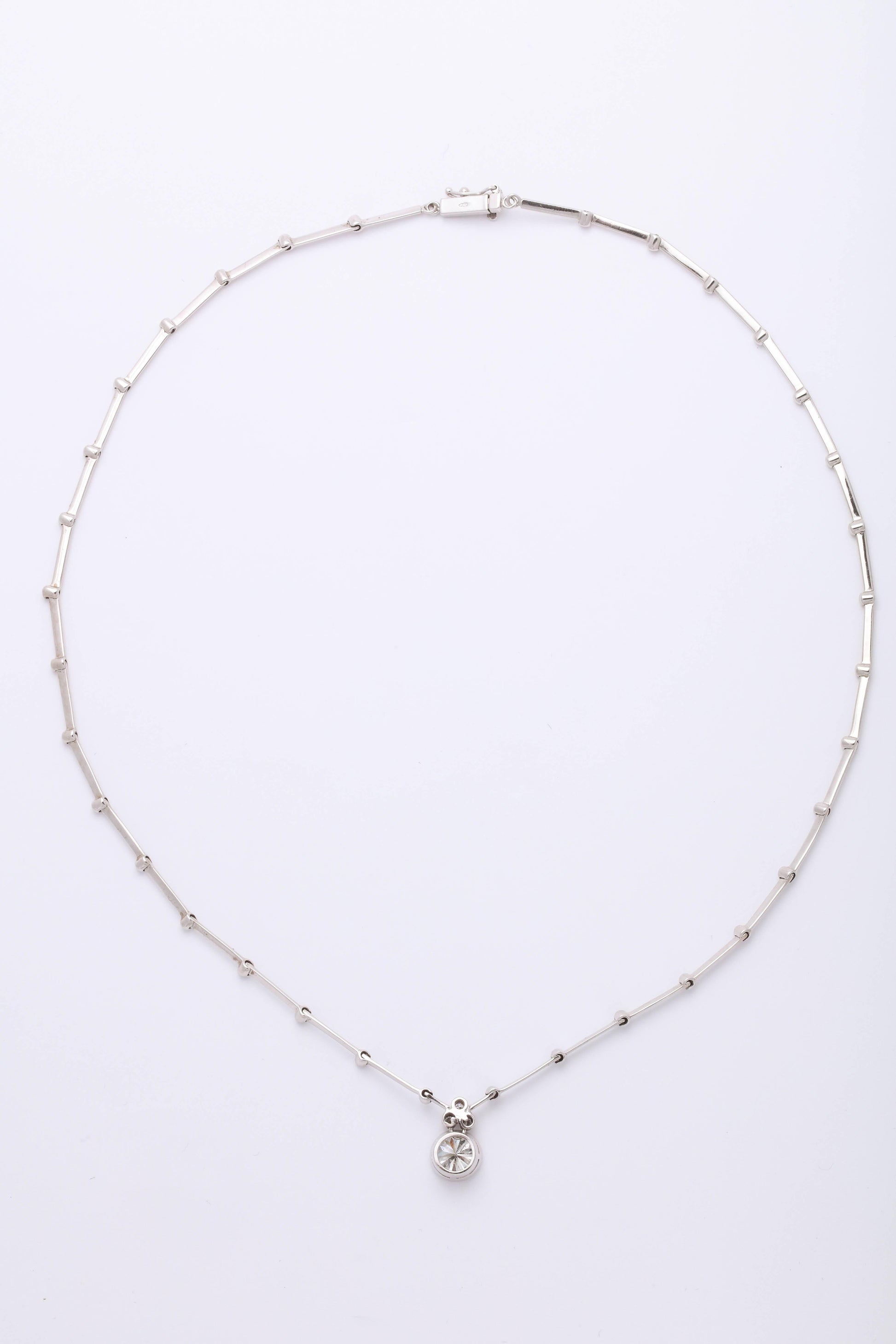 https://a.1stdibscdn.com/round-diamond-solitaire-necklace-gia-certified-for-sale-picture-4/0/j_42665831525894122586/6R1A9447_master.jpg