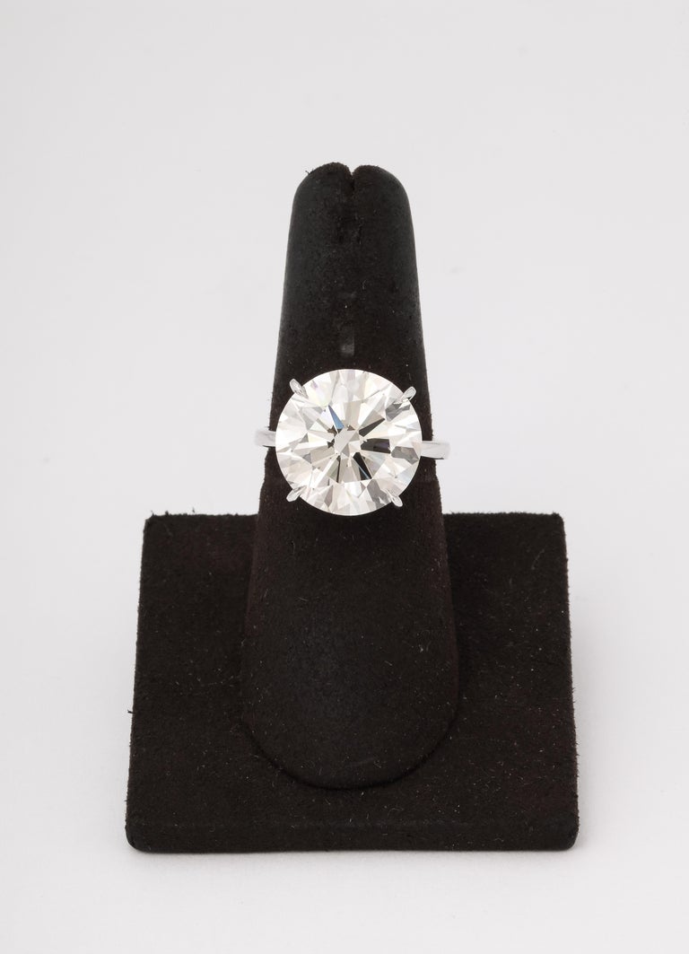 https://a.1stdibscdn.com/11-carat-round-diamond-engagement-ring-for-sale-picture-5/j_415/j_165034421658770700097/6R1A9534_master.jpg?width=768