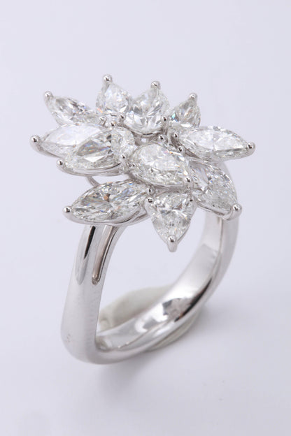 https://a.1stdibscdn.com/diamond-cluster-ring-for-sale-picture-6/0/j_50847211539355653406/6R1A9569_master.jpg