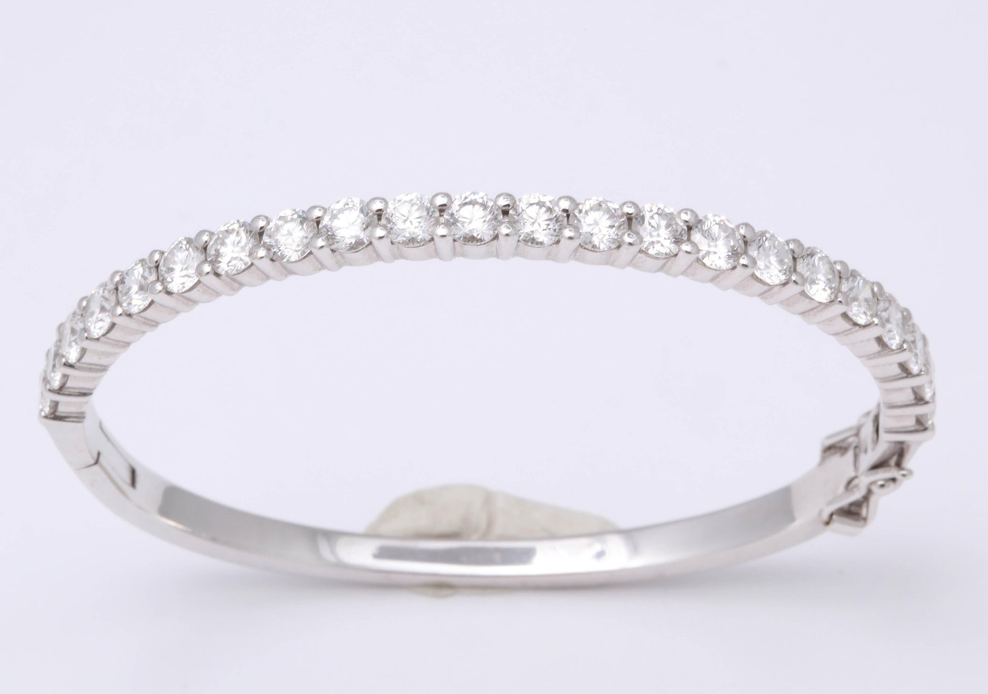 https://a.1stdibscdn.com/diamond-bangle-for-6-inch-wrist-for-sale-picture-5/0/j_50847111539355641823/6R1A9599_master.jpg
