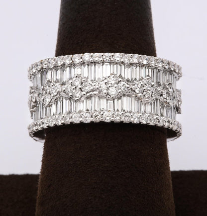 https://a.1stdibscdn.com/wide-baguette-and-round-diamond-band-for-sale-picture-4/j_415/1606754927586/6R1A9891_master.jpg?width=768