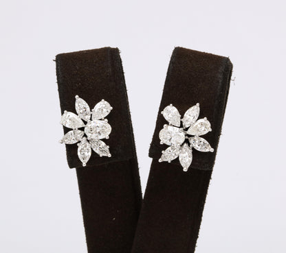 https://a.1stdibscdn.com/diamond-cluster-earrings-for-sale-picture-8/j_415/j_141445021639062296514/6R1A9903_master.jpg
