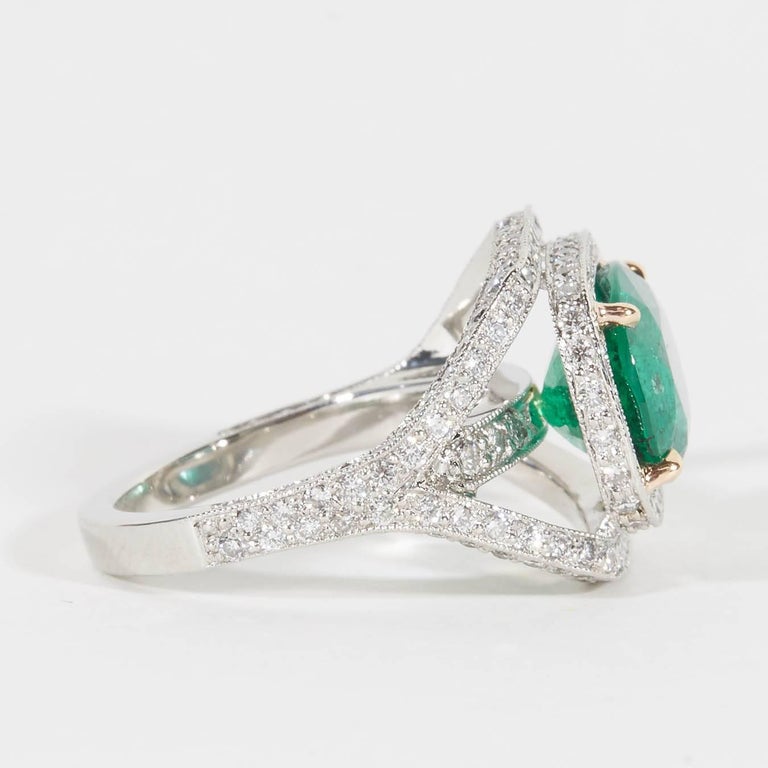 https://a.1stdibscdn.com/emerald-and-diamond-ring-for-sale/1121189/j_33909831595578258090/3390983_master.jpg?width=768