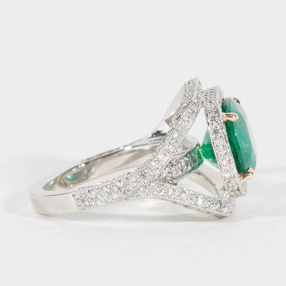 https://a.1stdibscdn.com/emerald-and-diamond-ring-for-sale/1121189/j_33909831595578258090/3390983_master.jpg?width=768