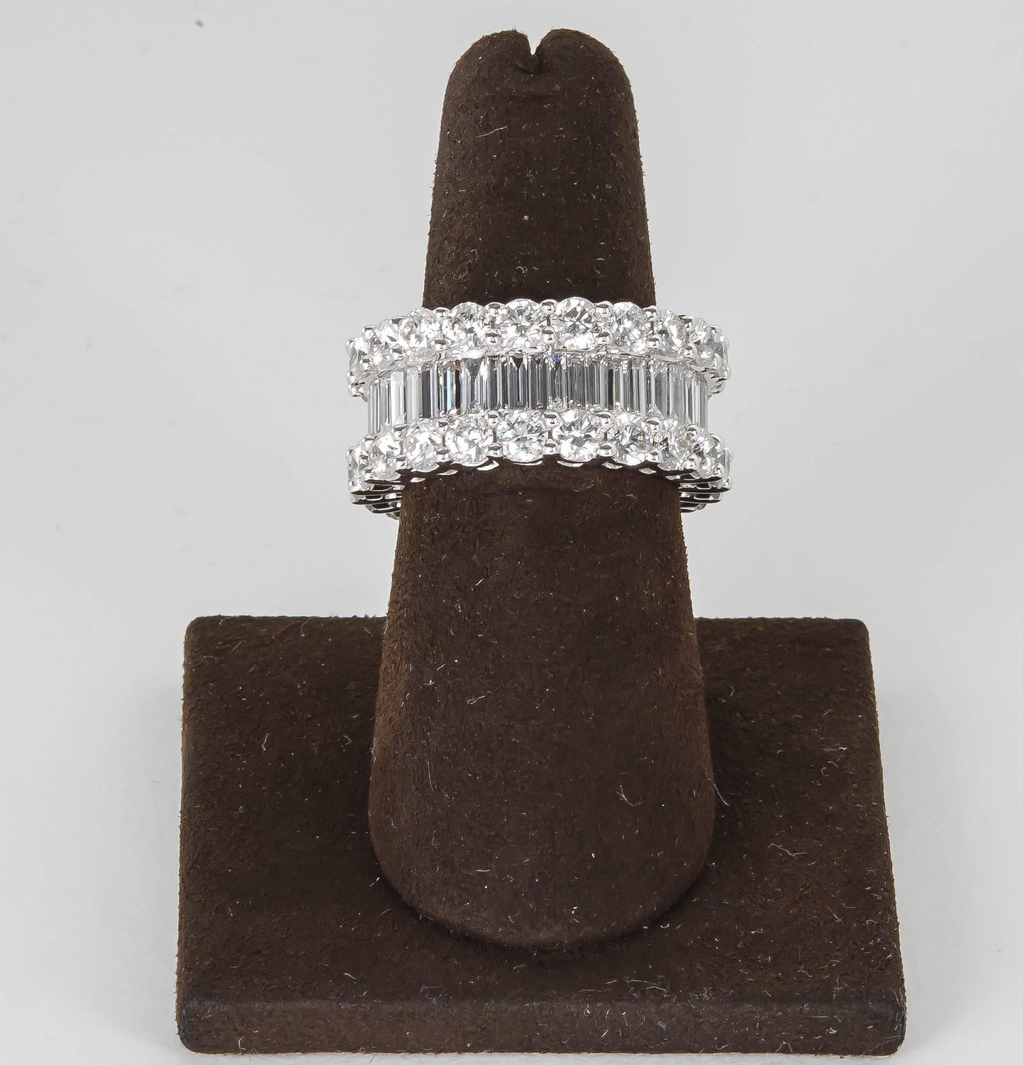 https://a.1stdibscdn.com/wide-8-carat-baguette-and-round-diamonds-gold-eternity-band-ring-for-sale-picture-5/j_415/j_95793121590588136413/781A7203_master.jpg