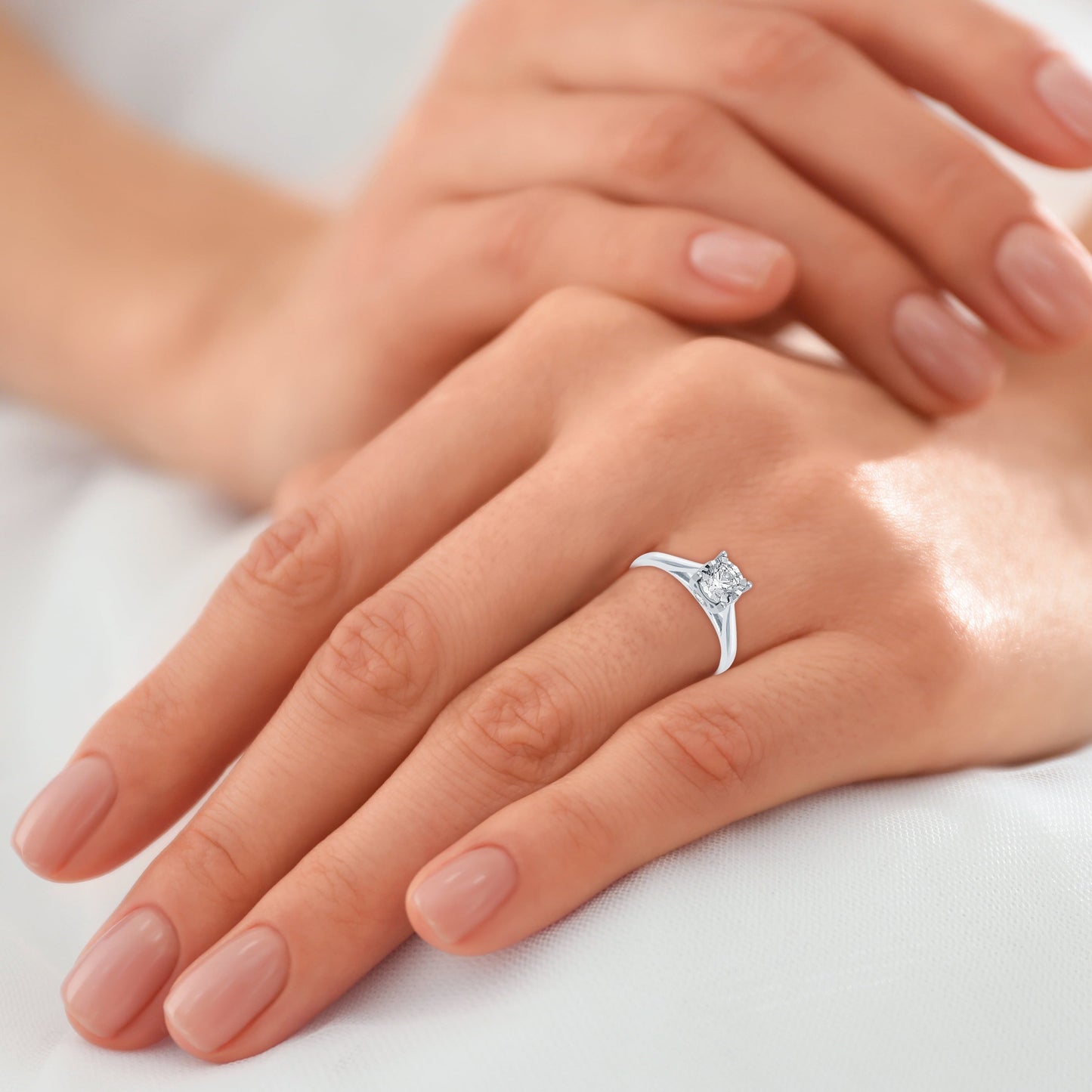1/2 Carat T.W. round Diamond 10 Kt White Gold Miracle Plate Solitaire Engagement Ring
