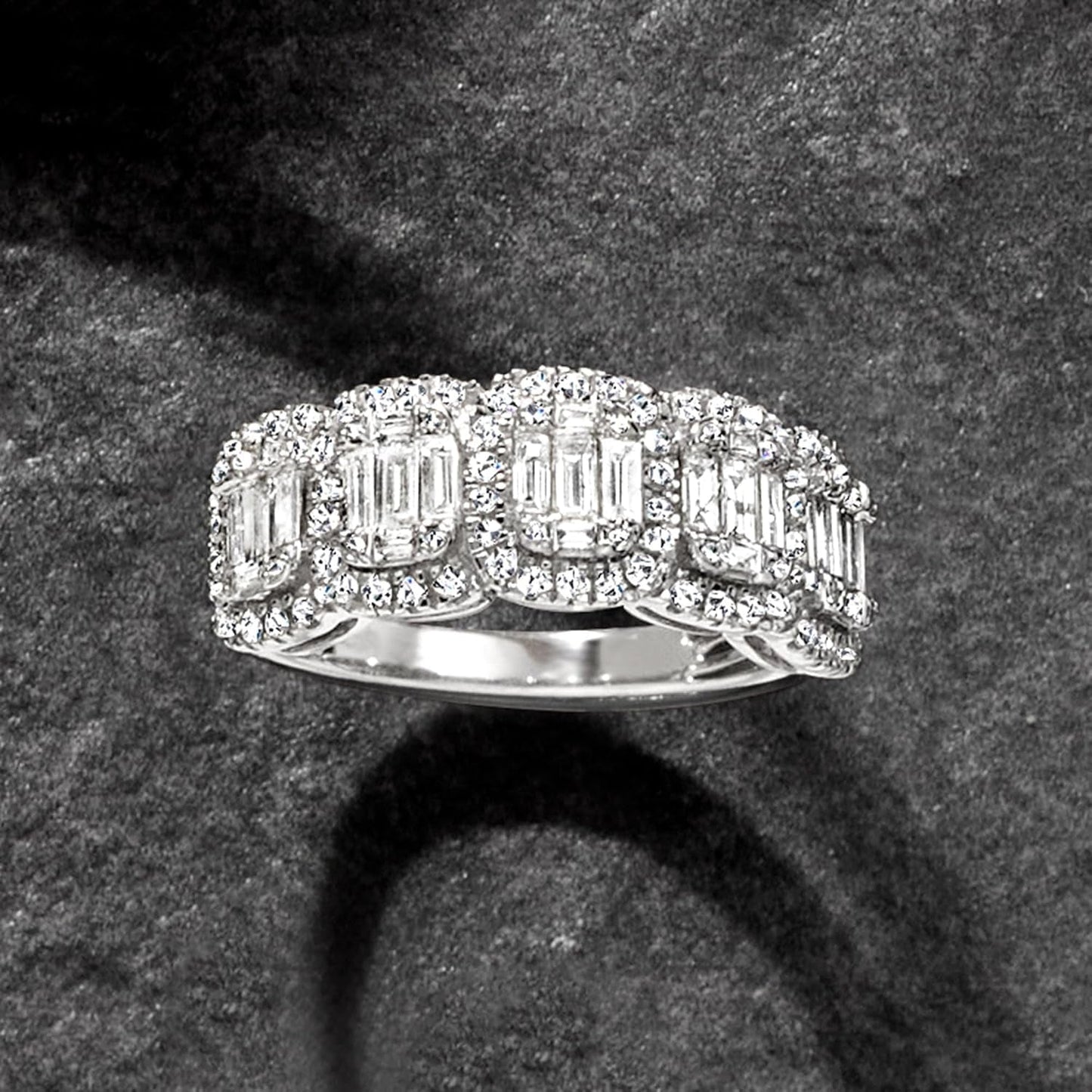 1.00 Ct. T.W. round and Baguette Diamond Ring in Sterling Silver. Size 8