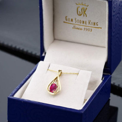 10K Yellow Gold Red Created Ruby and White Diamond Teardrop Pendant Necklace for Women (0.50 Cttw, Gemstone July Birthstone, Oval 6X4MM, with 18 Inch Chain) - WORLD TIME VISITS