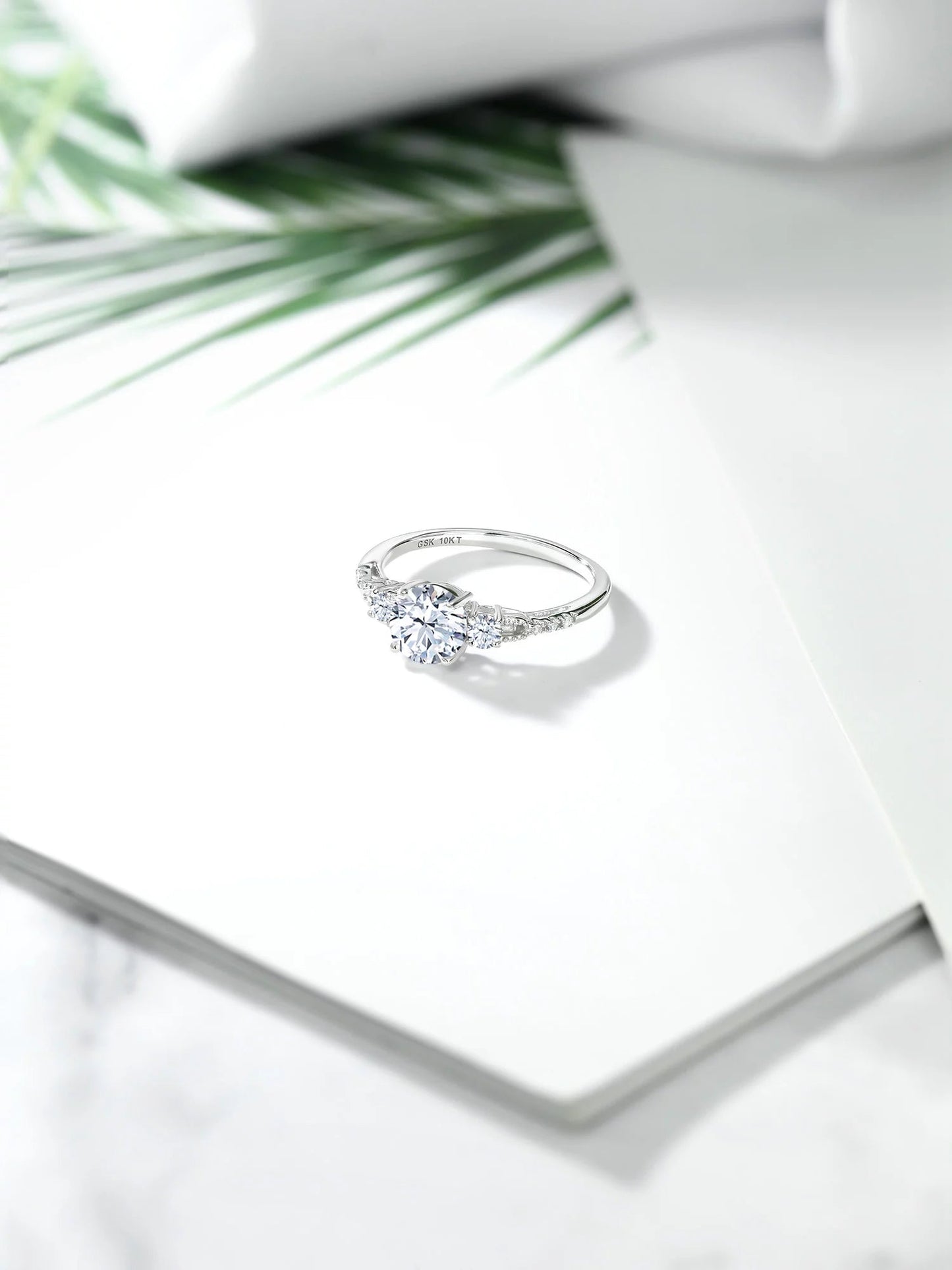 10K White Gold White Created Sapphire and White Diamond Accent 3-Stone Engagement Ring for Women (1.35 Cttw, round 6MM, Gemstone September Birthstone, Size 9)