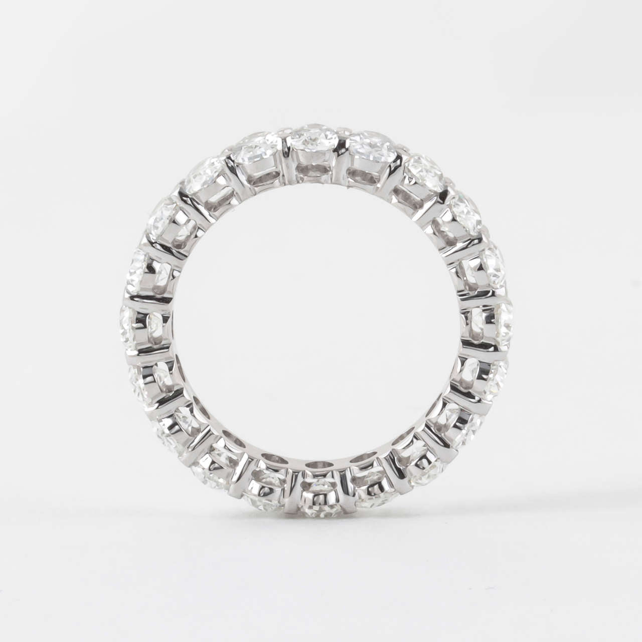 Exquisite 4.86 Carat Oval Diamond 18k White Gold Eternity Band