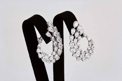 Diamond Scene Stunning 15.49ct Pear Shaped Diamond Gold Swirl Earrings