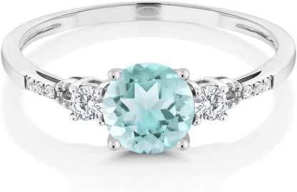 10K White Gold Sky Blue Topaz White Created Sapphire and White Diamond Accent 3-Stone Engagement Ring for Women (1.05 Cttw, round 6MM, Gemstone November Birthstone)
