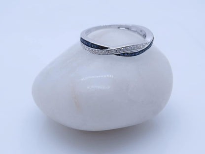 round Blue Sapphire & White Diamond Swirl Wedding Ring for Women in Solid Gold
