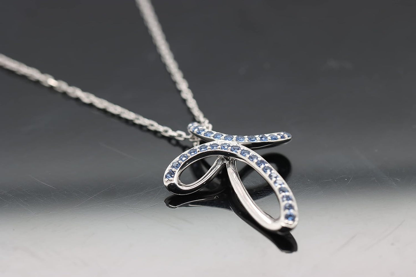 Mothers Day Gifts 1.2MM round Cut Blue Sapphire Infinity Cross Necklace Pendant - 14K White Gold over 925 Sterling Silver Twist Cross Necklace for Women with 18" Chain (Clarity-Vvs1, Color-Blue, 0.12 Carat)