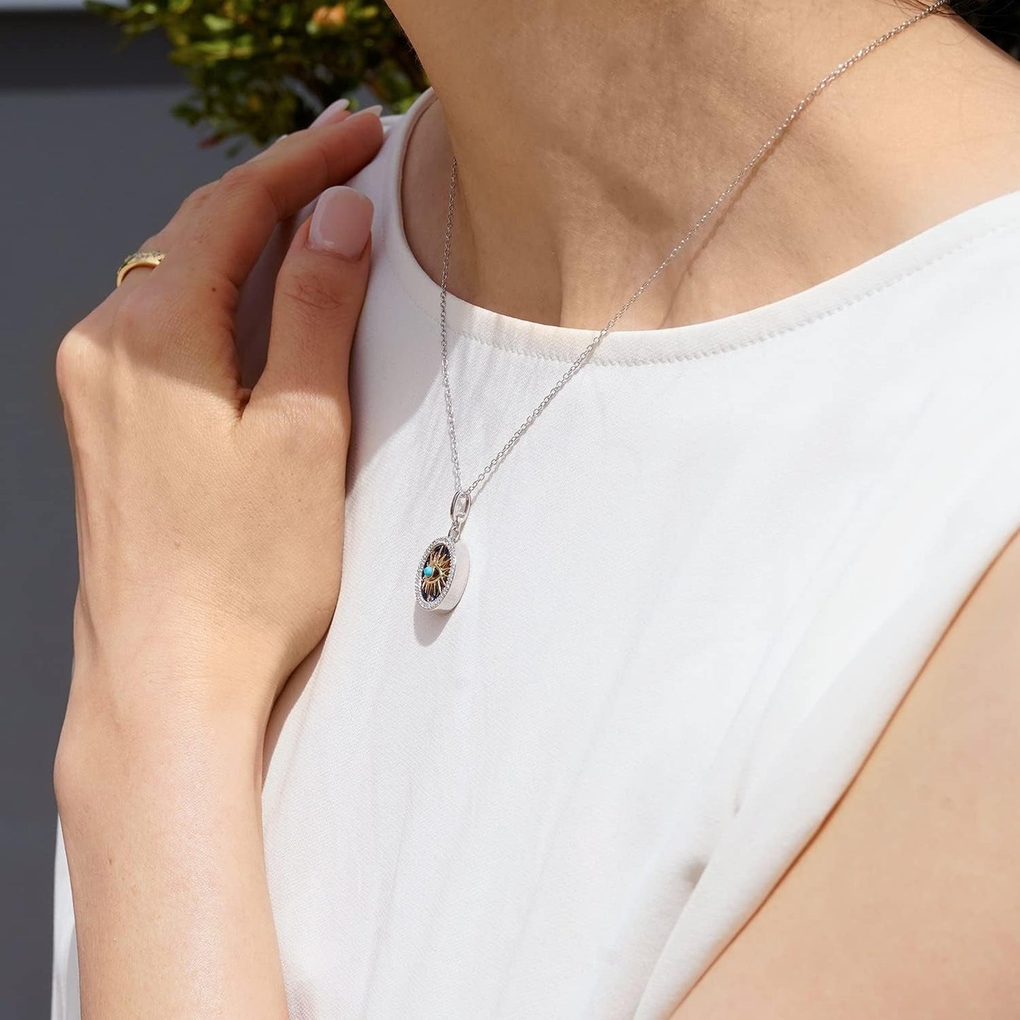 Hallmark Fine Jewelry Sterling Silver and 14K Yellow Gold with 1/6 Cttw Natural White round Diamonds with 13MM Lapis and 2MM Synthetic Turquoise Evil Eye Pendant Necklace, 18" Cable Chain