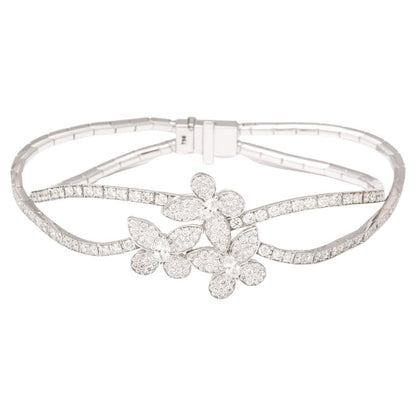 https://a.1stdibscdn.com/triple-butterfly-diamond-bracelet-for-sale/j_415/j_154513021650038162666/j_15451302_1650038164007_bg_processed.jpg?width=768
