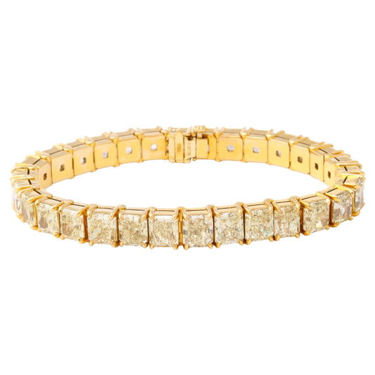 https://a.1stdibscdn.com/radiant-cut-yellow-diamond-bracelet-for-sale/j_415/j_161975821655912033262/j_16197582_1655912034300_bg_processed.jpg
