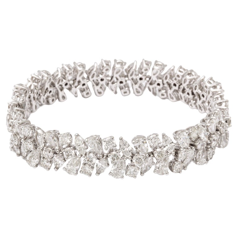 https://a.1stdibscdn.com/diamond-bracelet-for-sale/j_415/j_161980821655913468829/j_16198082_1655913470069_bg_processed.jpg?width=768