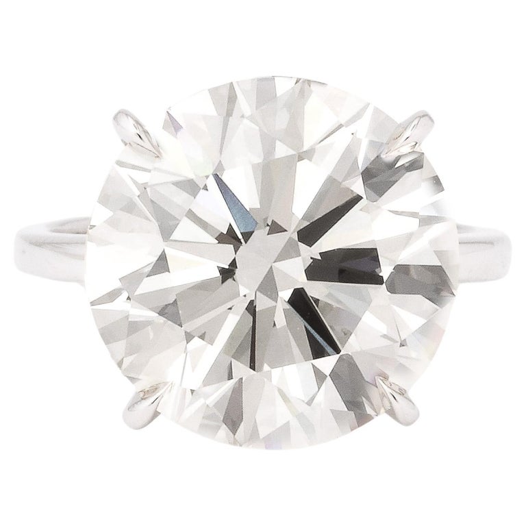 https://a.1stdibscdn.com/11-carat-round-diamond-engagement-ring-for-sale/j_415/j_165034421658770667824/j_16503442_1658770668386_bg_processed.jpg?width=768