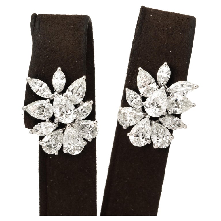 https://a.1stdibscdn.com/diamond-cluster-earrings-for-sale/j_415/j_172984621666015929084/j_17298462_1666015930216_bg_processed.jpg?width=768