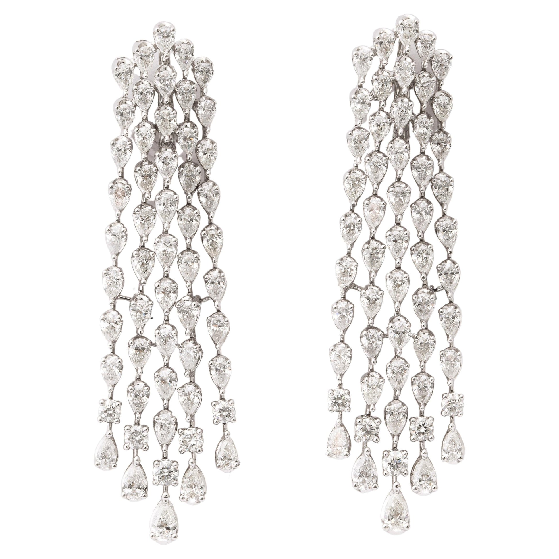 https://a.1stdibscdn.com/diamond-earrings-for-sale/j_415/j_180977621672757077082/j_18097762_1672757078348_bg_processed.jpg