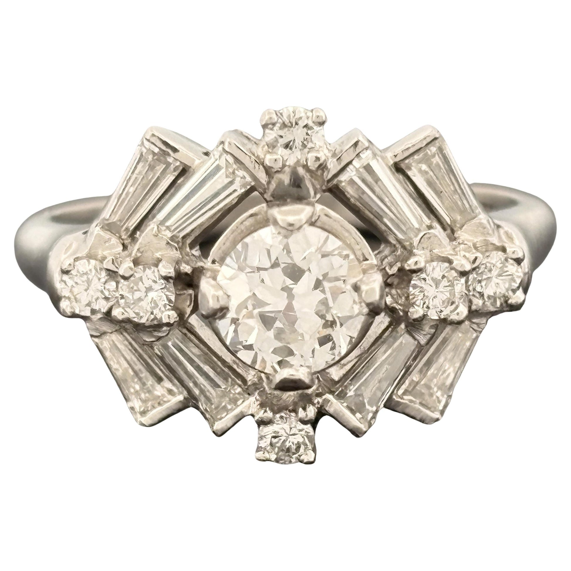 https://a.1stdibscdn.com/vintage-mid-century-platinum-european-cut-diamond-cocktail-ring-187ctw-for-sale/j_43992/j_284448821769459946968/j_28444882_1769459947836_bg_processed.jpg